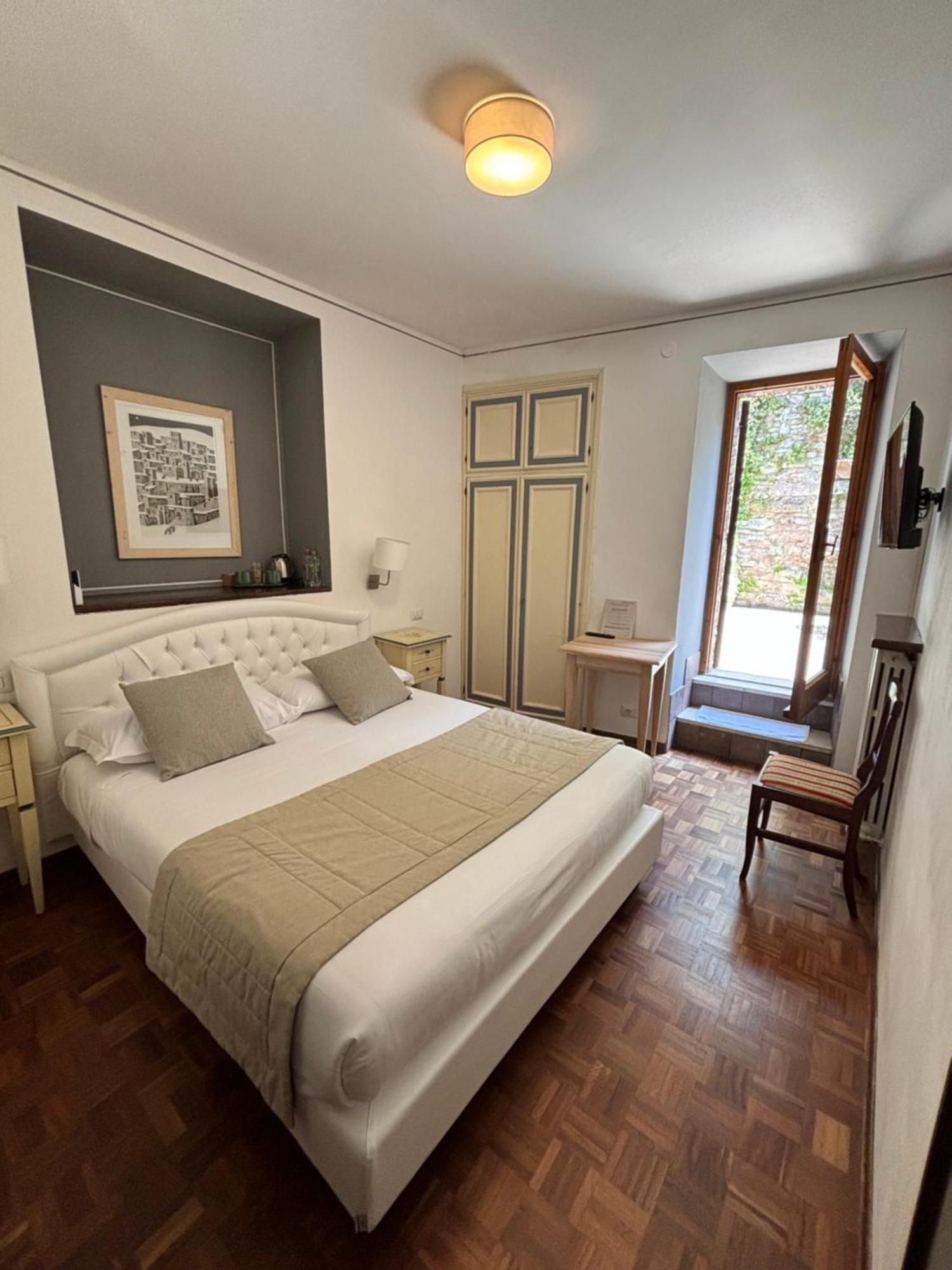 Hotel La Fortezza Ассизи Экстерьер фото